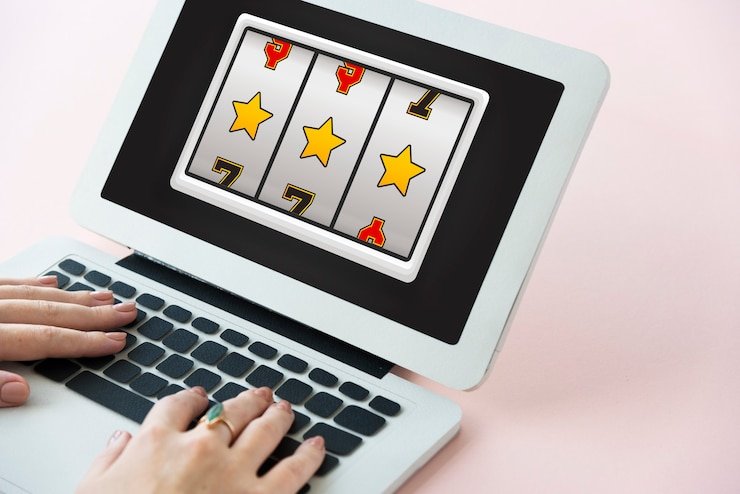 Bikini Paradise slot interface on mobile phone showing spin controls and win display